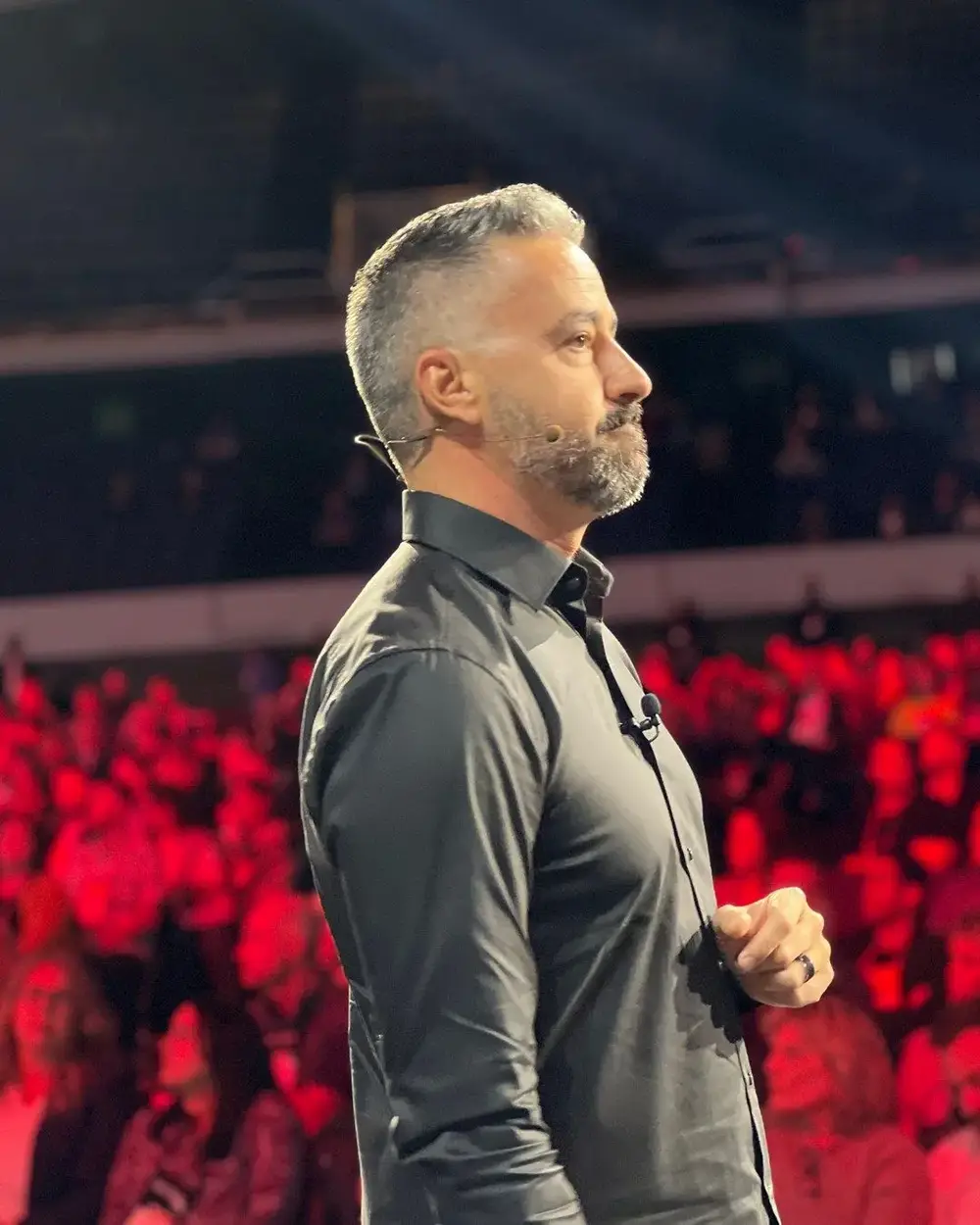 Brett Tanner speaking on stage